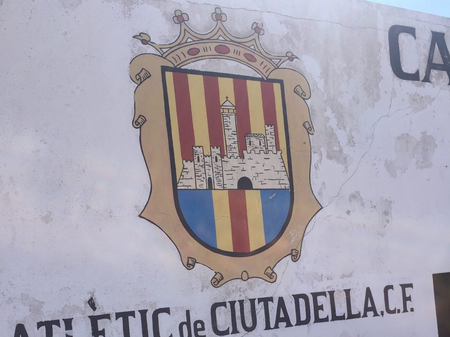 Atletic de Ciutadella logo on a wall