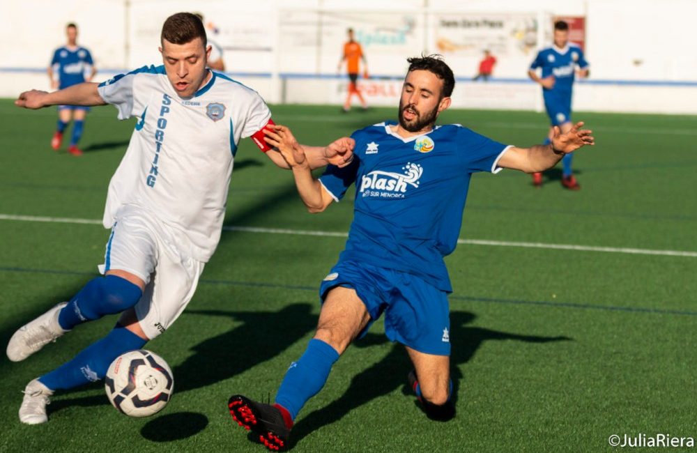 Sant Lluis tackles CF Sporting de Mahon player